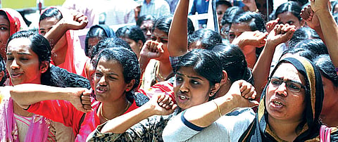 Members of United Nurses Association taking out a protest march raising various demands including salary hike in front of the High Court in Kochi on Wednesday | K Shijith