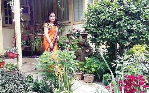 Amrita Pradhan in her garden