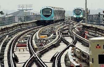Kochi Metro trains approaching Muttom station on a rainy Wednesday | Albin Mathew