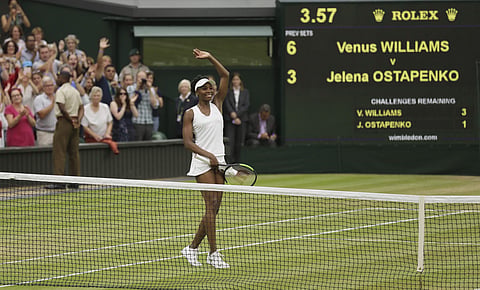 Venus Williams of the United States celebrates after beating Latvia's Jelena Ostapenko at the end of their Women's Quarterfinal Singles Match. | AP
