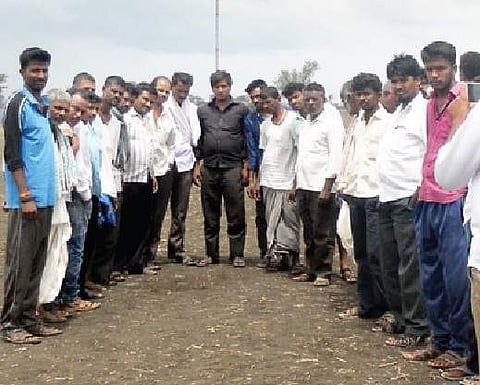 Villagers at the area where footprints of a white creature were spotted