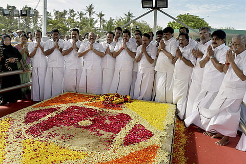 Tamil Nadu Chief Minister K Palaniswami along with other cabinet ministers paying homage to late AIADMK Supremo J Jayalalithaa at her memorial following the end of Assembly Session in Chennai on Wednesday. | PTI