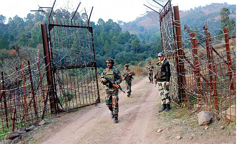 Soldiers take position near the Line of Control LoC in Poonch after cross-border shelling from Pakistan.| file- PTI