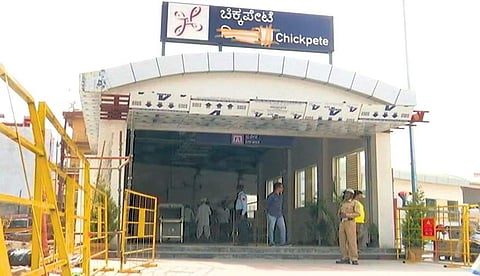 A concealed Hindi signage on a Bengaluru Metro board