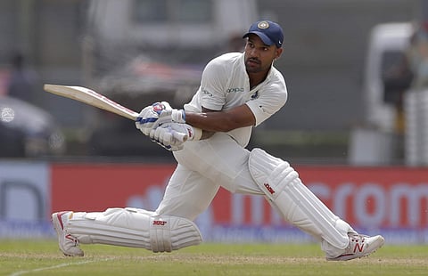 Shikhar Dhawan plays a shot during the first day's play of the first test cricket match between India and Sri Lanka / AP