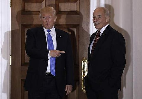 President-elect Donald Trump talks to media as he stands with retired Marine Gen. John Kelly. (File | AP)