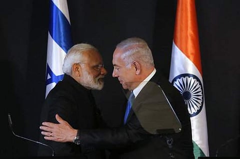 Indian Prime Minister Narendra Modi, left, shakes hands with Israeli Prime Minister Benjamin Netanyahu during their meeting at the King David hotel in Jerusalem, Wednesday, July 5, 2017. | AP