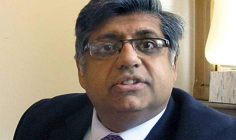 This April 5, 2017 photo shows Faisal Gill, newly elected chairman of the Vermont Democratic Party, in the party's office in Montpelier, Vt. Gill is a Pakistani-born lawyer believed to the be first Muslim to lead a state party in the U.S. (Photo: Lisa Rat