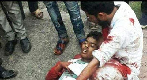 A photo of 16-year-old Junaid Khan who was lynched on a train, moments before his death, shared on social media.