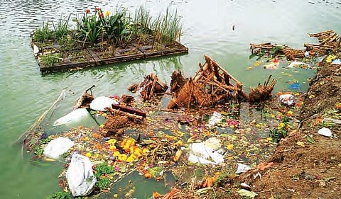 Neknampur lake affected due to pollution as a result of Ganesha idol immersion | EXPRESS PHOTO