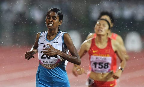 Indian athlete P U Chitra competes in the women's 1500m event during the second day of the 22nd Asian Athletics Championships.|AFP