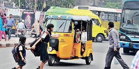 File picture of schoolchildren crossing a busy road | express photo
