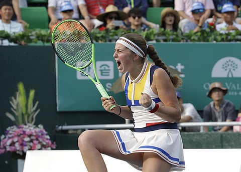 Jelena Ostapenko celebrates after entering the final of Korea Open (AP)