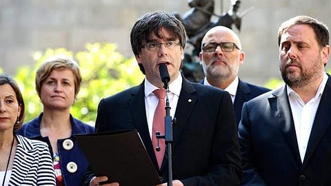 The leader of Spain’s Catalonia region, Carles Puigdemont, speaks during an statement in Barcelona. (Photo | AP)