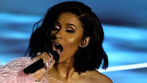 Cardi B whose real name, Belcalis Almanzar, is also the first female soloist to top the Hot 100 with a debut track unaccompanied by another artist since Meghan Trainor's ‘All About That Bass’ in 2014.