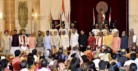 President Ram Nath Kovind Vice President M. Venkaiah Naidu Prime Minister Narendra Modi poses with new members of cabinet after the reshuffle at Rashtrapati Bhavan in New Delhi on Sunday. (PTI)