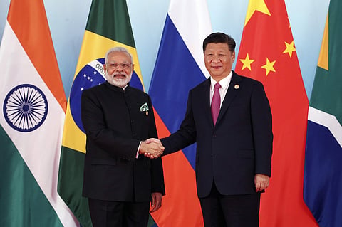 Prime Minister Narendra Modi and Chinese President Xi Jinping held their first substantive bilateral meeting after the Dokalam standoff during the BRICS summit. (File | AP)