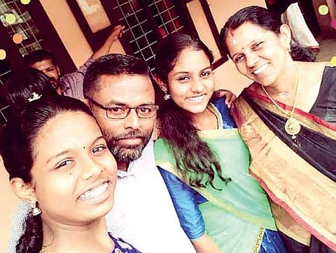 Devika Suresh (2nd from right), a student of Girideepam Bethany High School, Kottayam, with her family