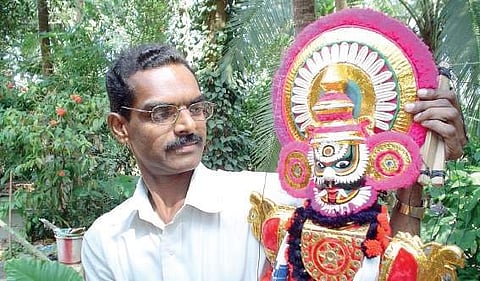 Artist K V Ramesh with one of the props