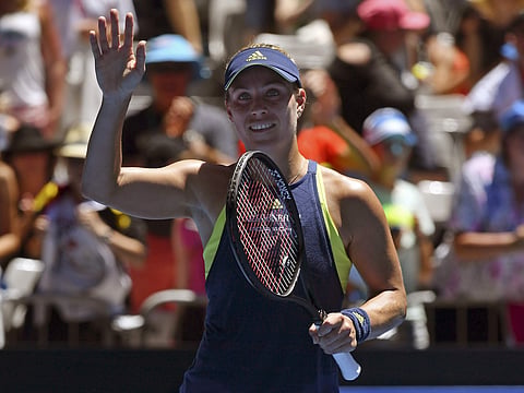 Germany's Angelique Kerber celebrates after defeating compatriot Anna-Lena Friedsam during their first round match at the Australian Open | AP