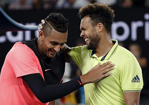 France's Jo-Wilfried Tsonga(R) congratulates Australia's Nick Kyrgios after winning their third round clash| AP