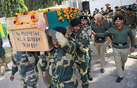 Border Security Force personnel carry the coffin of Head Constable A Suresh, who was killed in Pakistani cross-border firing, in Jammu on Thursday | PTI