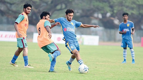 Akhil T (left) of MES College and Muhammed Parakkottil of Christ College vie for the ball at the TNIE GOAL 2018 all-Kerala inter-collegiate football tournament at Maharaja’s College Stadium in Kochi on Sunday | MELTON ANTONY