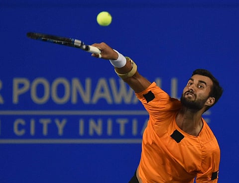 Yuki Bhambri plays a shot during his match against Arjun Kadhei at Maharashtra Open 2018 in Pune on Tuesday. | PTI