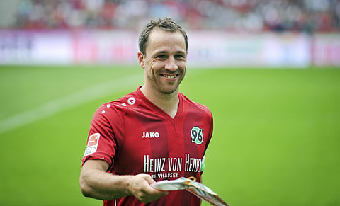 In this Aug. 10, 2014 file photo Hannover's Steven Cherundolo smiles during the soccer test match between Hannover 96 and Lazio Rom at the HDI-Arena in Hannover, Germany. | AP