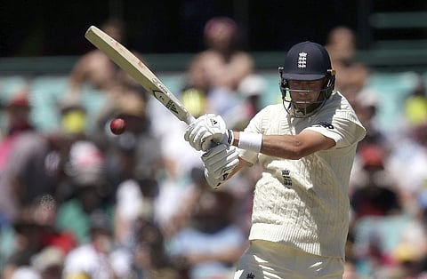 England's Stuart Broad plays a shot off Australia's Pat Cummins during the second day of their Ashes Test match in Sydney, Friday, Jan. 5, 2018. | AP