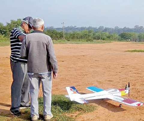 Enthusiasts flying remote controlled aircraft at Hessarghatta, the last remaining grassland in Bengaluru, which poses a serious threat to birds