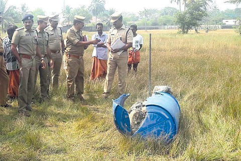 The police inspecting the site where the skeletal remains of the woman were found | Express