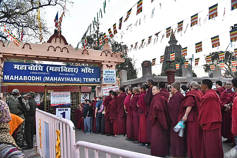 Police personnel stand guard near the premises of Mahabodhi Temple in Bodh Gaya. (Photo| PTI)