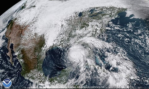 This satellite image made available by NOAA shows Hurricane Michael, center, in the Gulf of Mexico on Tuesday, Oct. 9, 2018 at 3:17 p.m. EDT. (Photo | AP)