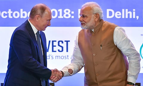 Prime Minister Narendra Modi shakes hands with Russian President Vladimir Putin during India-Russia Business Summit in New Delhi Friday October 5 2018. | (File | PTI)