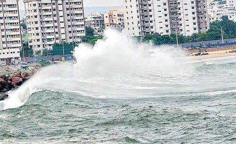 Big waves hitting the shore in Visakhapatnam on Wednesday under the influence of Titli | G satyanarayana