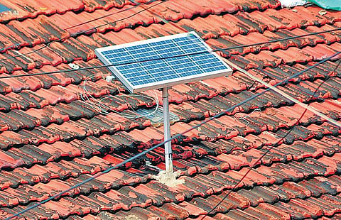 A solar panel set up atop a house in Shiraguppi village. | (D Hemanth | EPS)