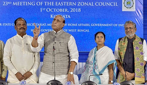 Union Home Minister Rajnath Singh 2nd L West Bengal Chief Minister Mamata Banerjee R Jharkhand Chief Minister Raghubar Das L and Bihar Deputy Chief Minister Sushil Kumar Modi attend the 23rd meeting of the Eastern Zonal Council at Nabanna Chief Minister o