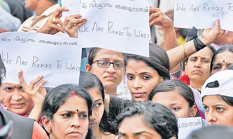 Women devotees staging a protest in front of Hanuman Swamy Temple at PMG Junction in Thiruvananthapuram against the Supreme Court decision allowing women’s entry to Sabarimala | B P Deepu