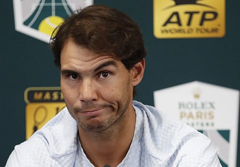 Bad tummy: Rafael Nadal lost his top spot to Djokovic as he pulled out of the Paris Masters due to abdominal problem | AP