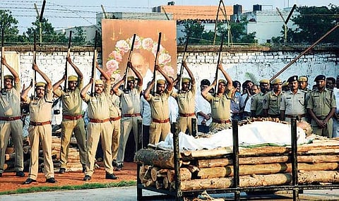 Police offer gun salute to MVVS Murthi at the funeral site near the GITAM University in Visakhapatnam on Sunday | Express