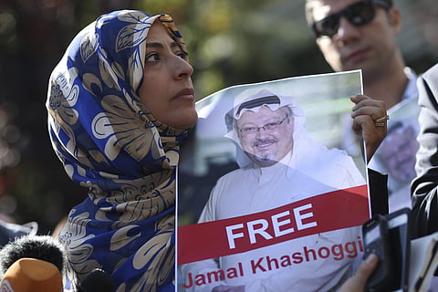 Holding a picture of missing Saudi writer Jamal Khashoggi, Tawakkol Karman, of Yemen the Nobel Peace Prize laureate for 2011, talks to members of the media near the Saudi Arabia consulate in Istanbul, Friday, Oct. 5, 2018. (Photo | AP)