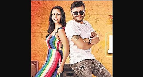 Priya Anand and Ganesh in Orange