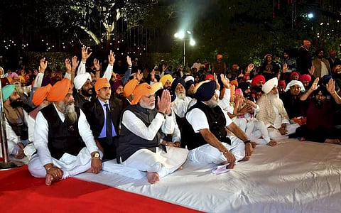 Prime Minister Narendra Modi attends a programme to celebrate Guru Nanak Dev Ji's birth anniversary at the residence of Union minister Harsimrat Kaur in New Delhi Friday November 23 2018.