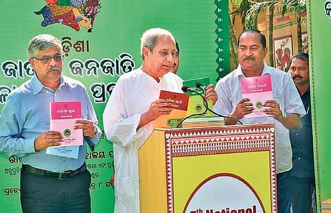 Chief Minister Naveen Patnaik releasing the dictionaries on Saturday | Express