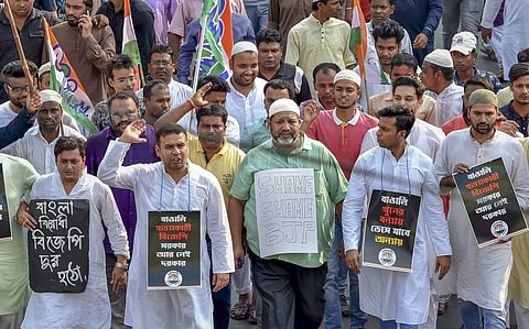 Trinamool Congress TMC activists hold a protest rally against the killing of innocent people in Tinsukia District of Assam last evening in Kolkata Friday November 02 2018. | PTI