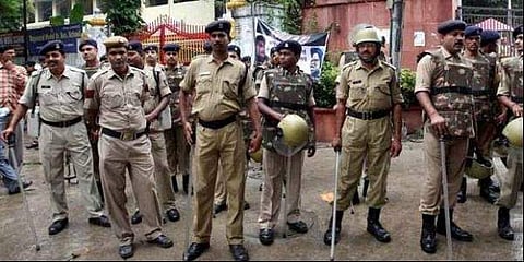 The accused allegedly impersonated police officers to threaten victims with false rape cases and demanded large settlement money.