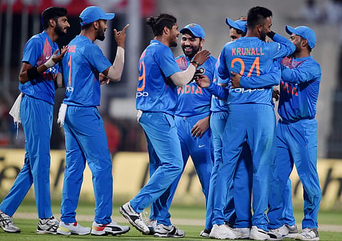 Indian players celebrate the dismissal of West Indies batsman Shai Hope during the 1st T20I match at Eden Garden in Kolkata. (Photo | PTI)