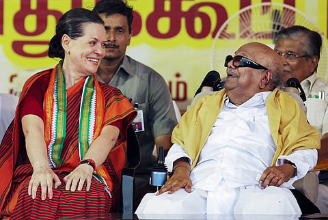 Former Congress president Sonia Gandhi with late TN CM Karunanidhi clicked during an event. (File photo | PTI)