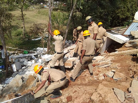 Rescue officials clearing the debris at I Mulbagal Desai Residential School (Photo | EPS)